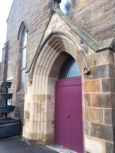 renovated stone archway entrance